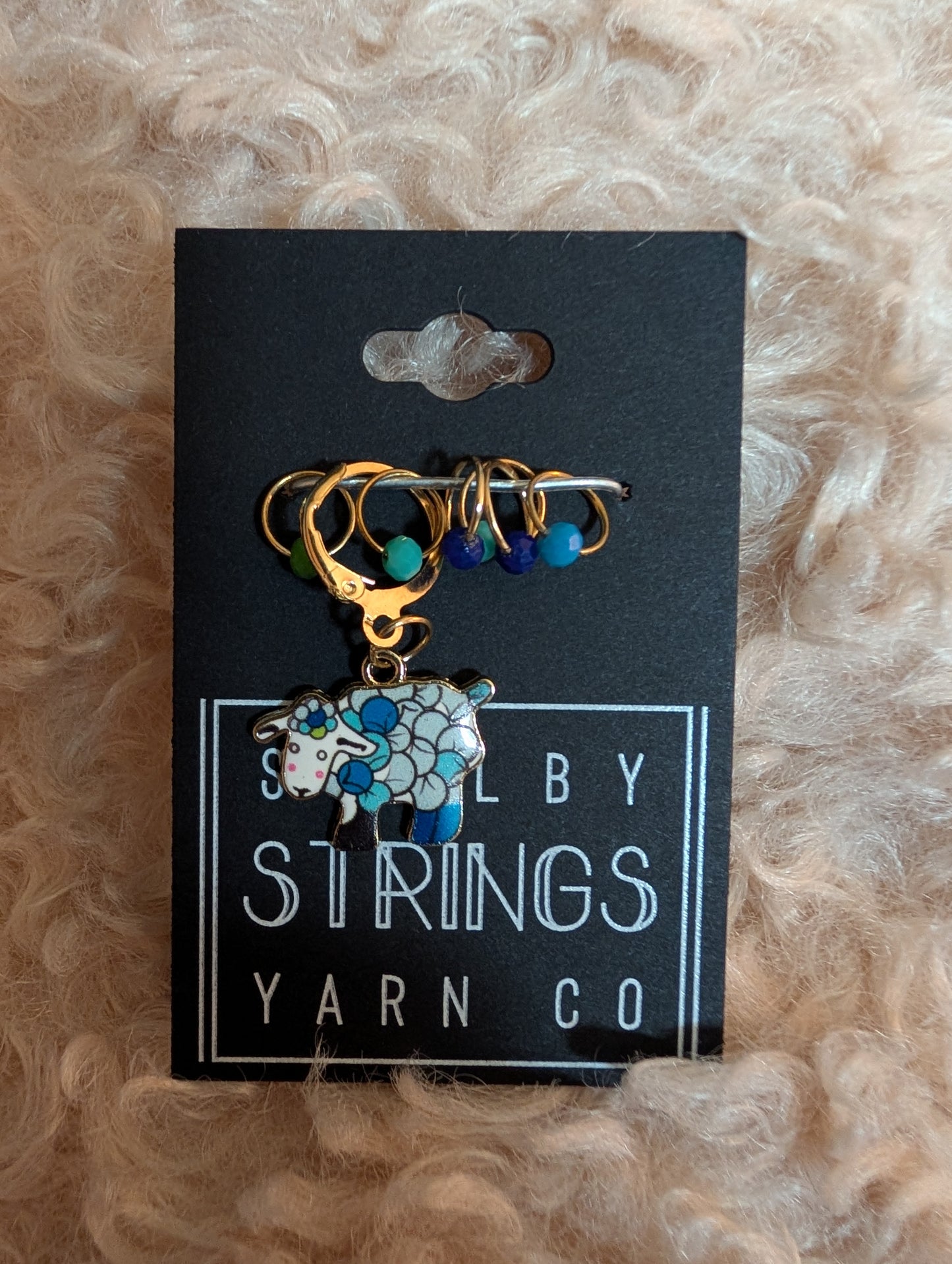 
                  
                    Charm with stitch markers
                  
                