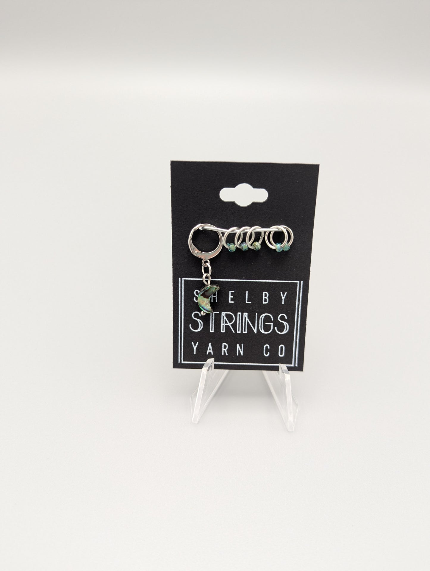 
                  
                    Stone beads with small stitch markers
                  
                