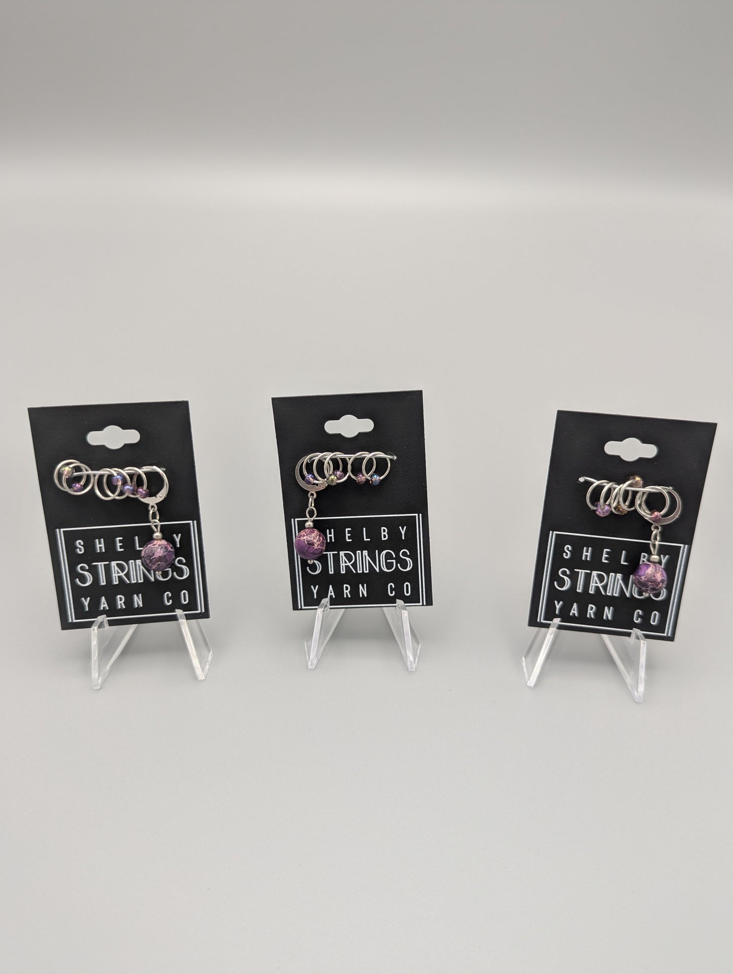 
                  
                    Stone beads with small stitch markers
                  
                