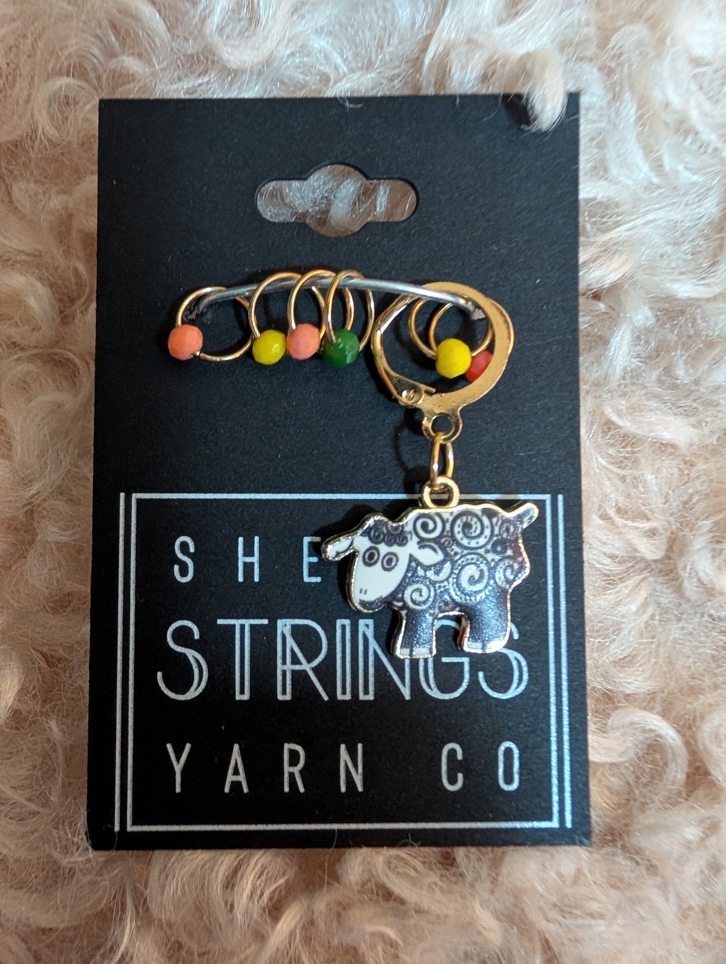 
                  
                    Charm with stitch markers
                  
                