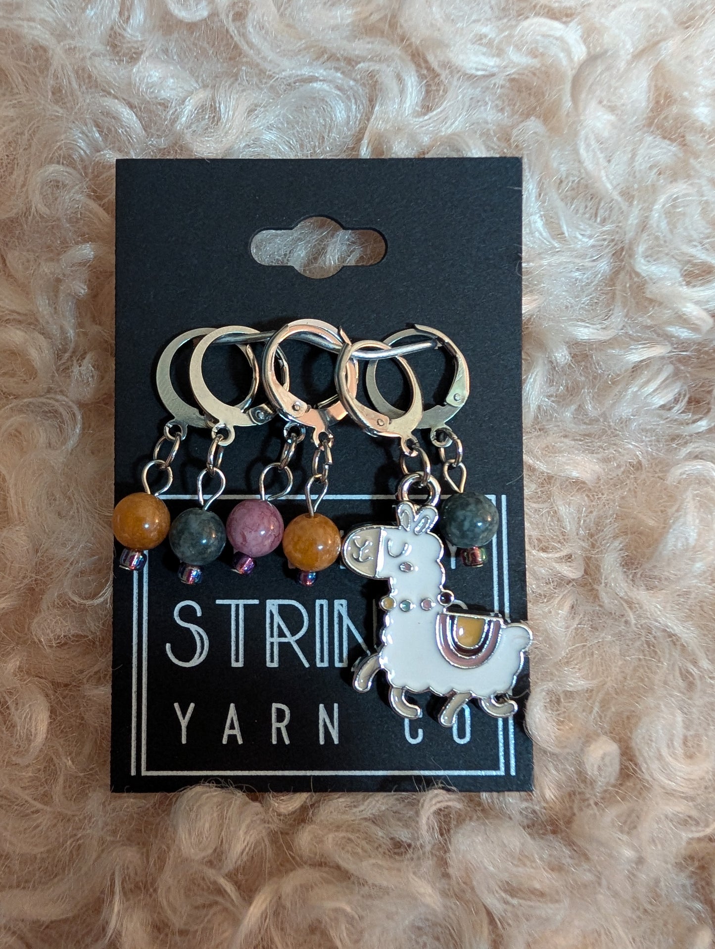 
                  
                    Charm with stitch markers
                  
                