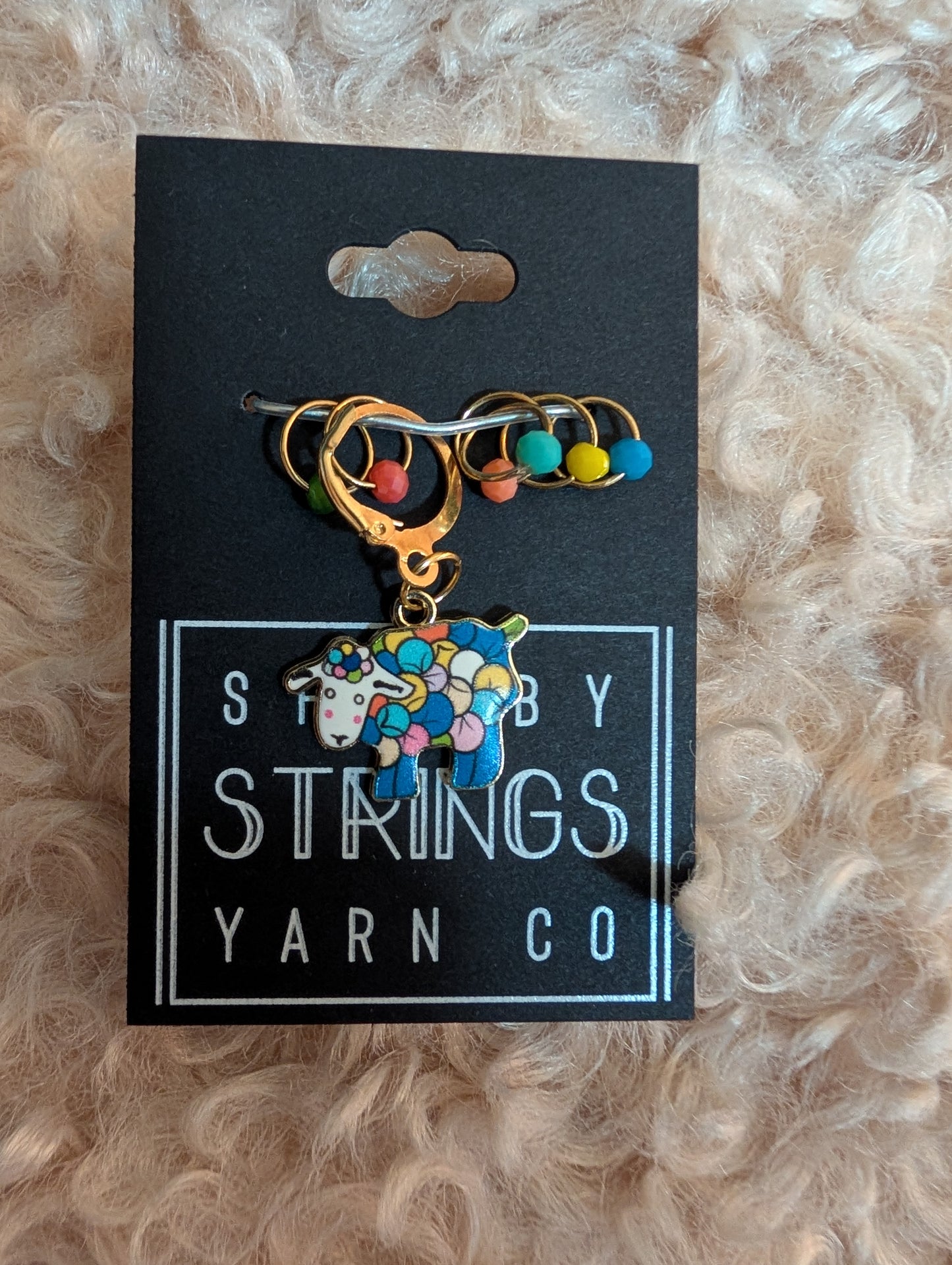 
                  
                    Charm with stitch markers
                  
                